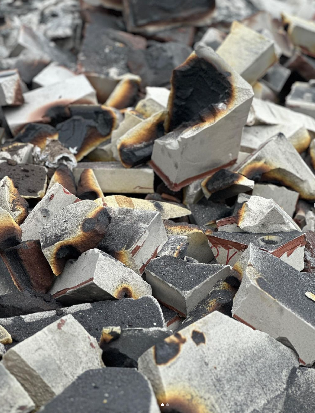 Burnt fragments, volcanic material reference